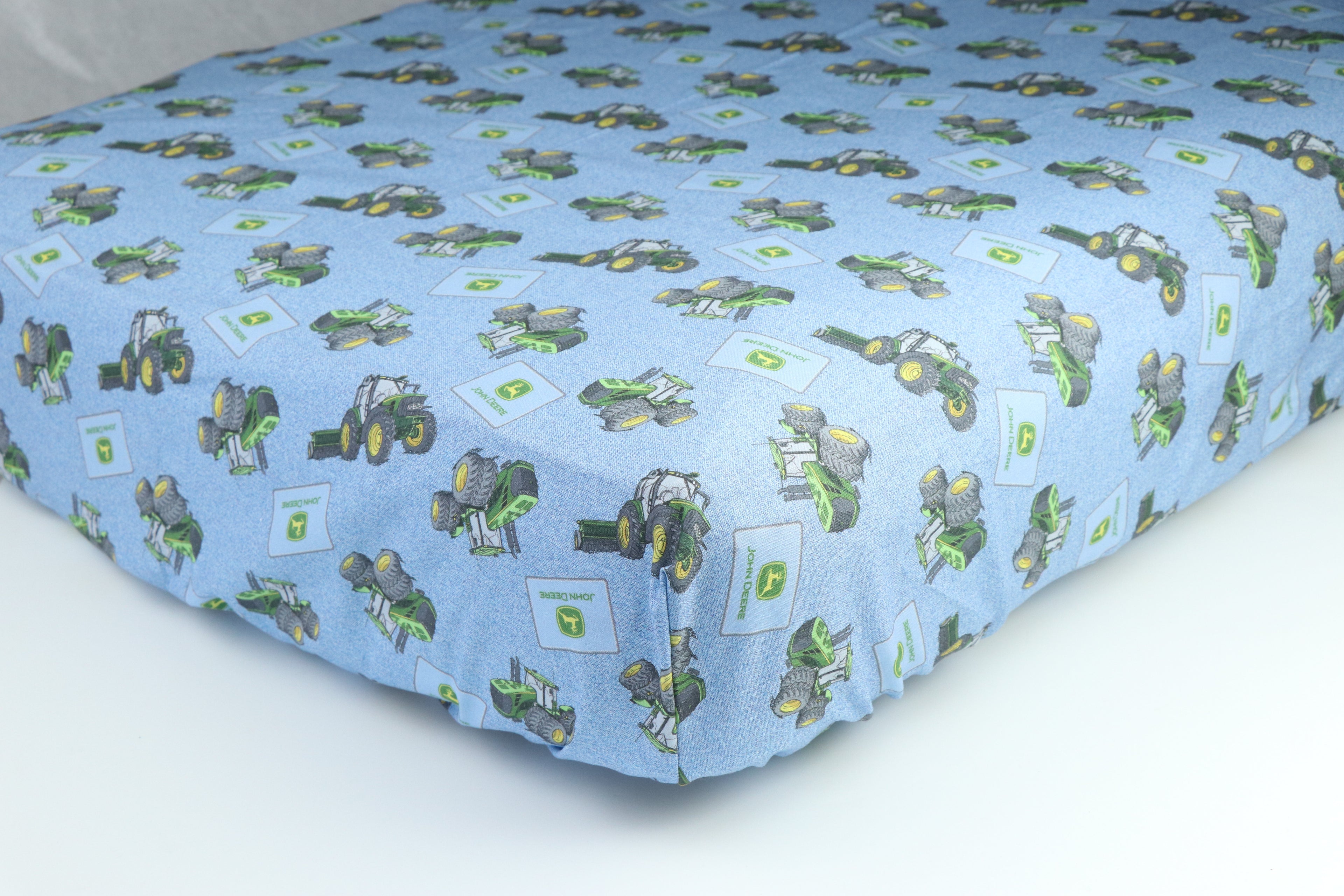Crib Sheet displaying John Deere Tractors, Blue Tractor Toss