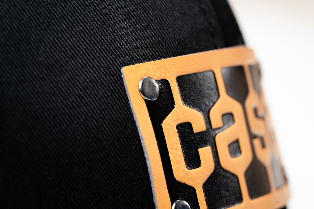 Case Tread Logo Leather Emblem Hat, Black Mesh